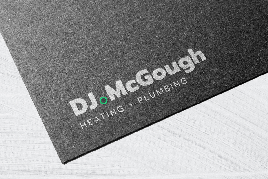 DJ McGough white logo